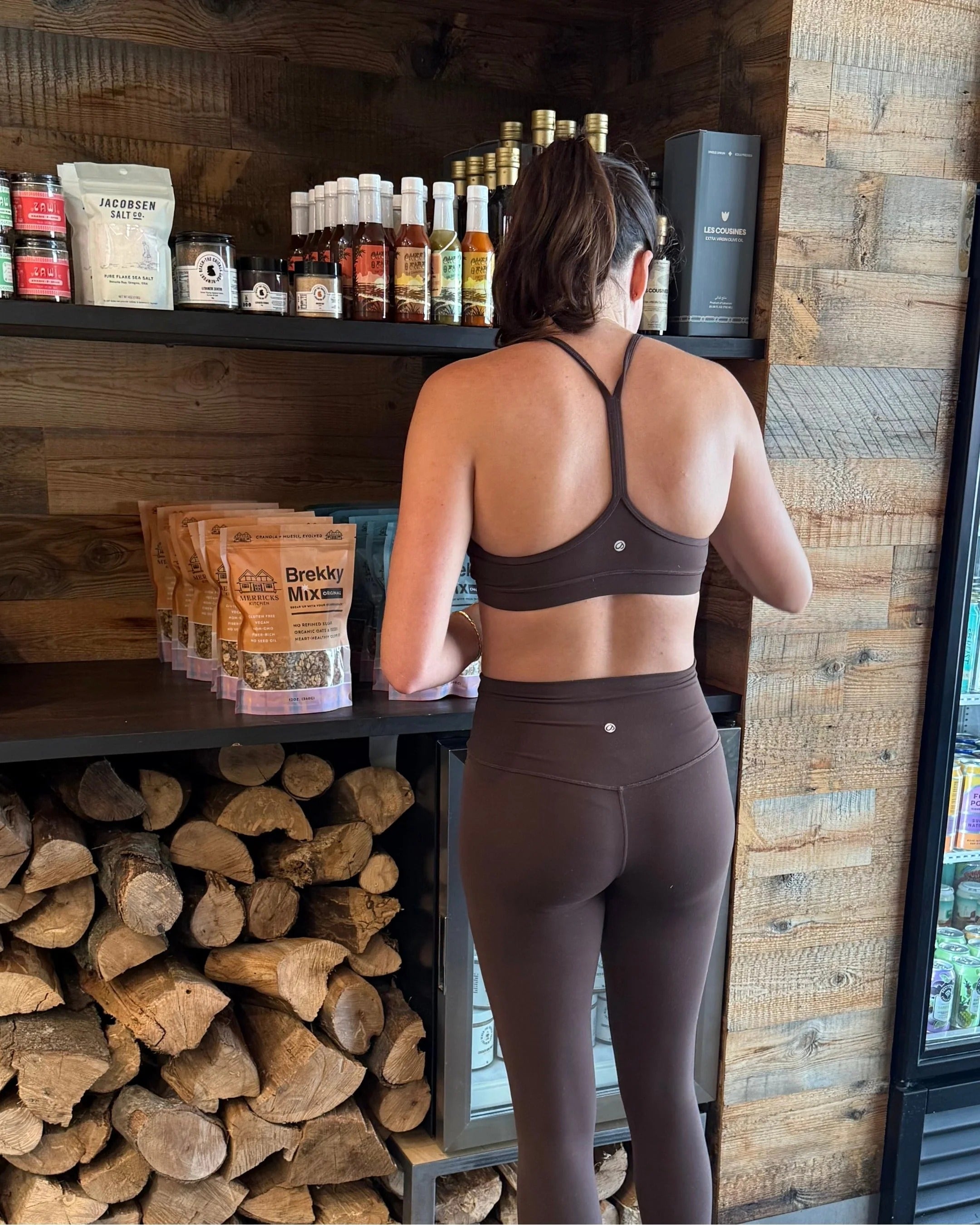 Woman choosing the healthiest granola 2025 Brekky Mix with zero sodium and low sugar for healthy breakfast